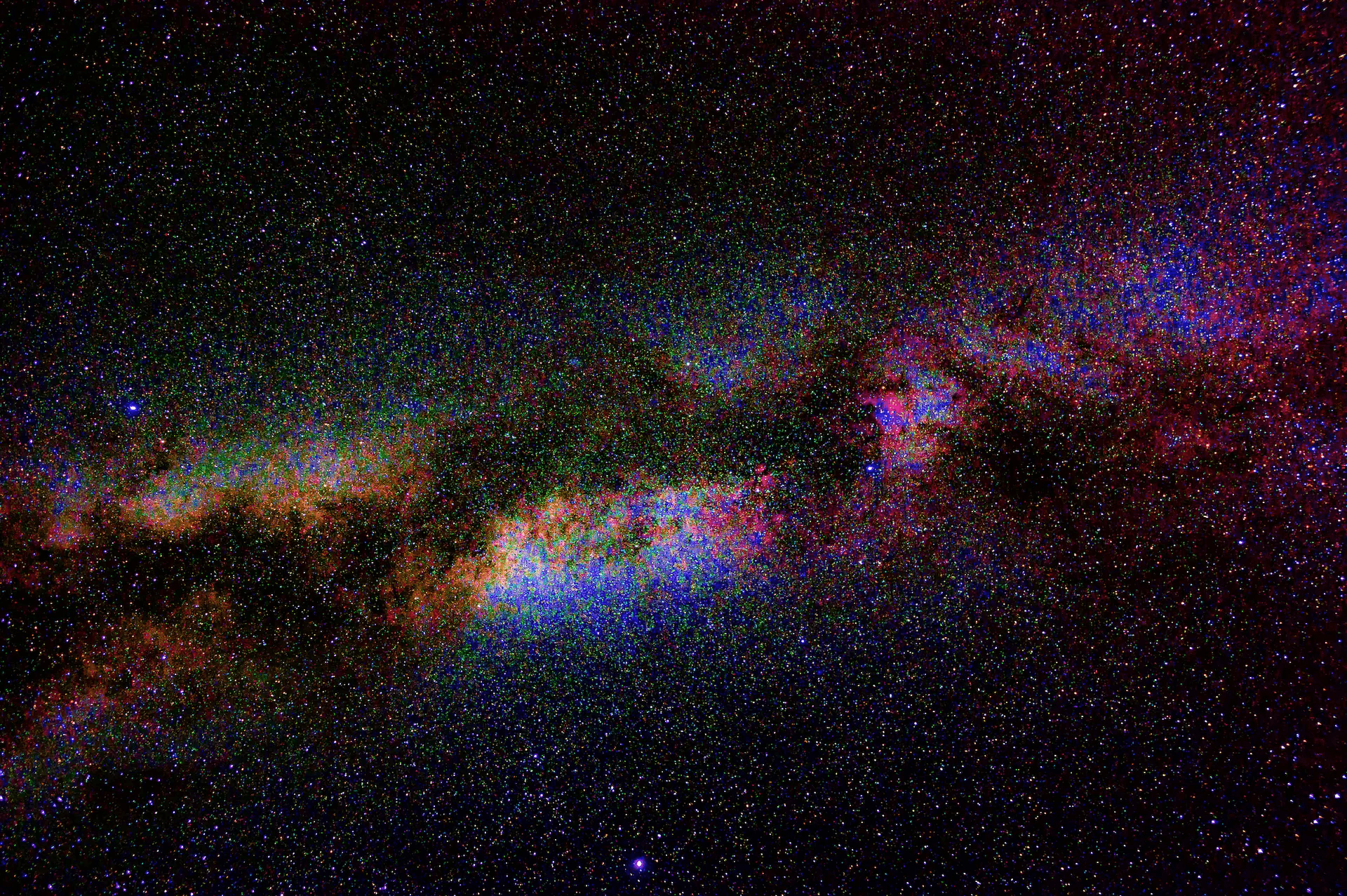 Astrophotography composition showing the Milky Way's galactic core rising over the Anza-Borrego Desert.