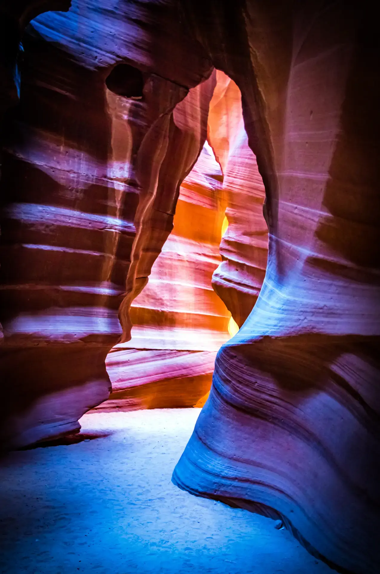 Antelope Canyon's Embrace Sunlight falling on curved sandstone walls inside Antelope Canyon, Arizona.