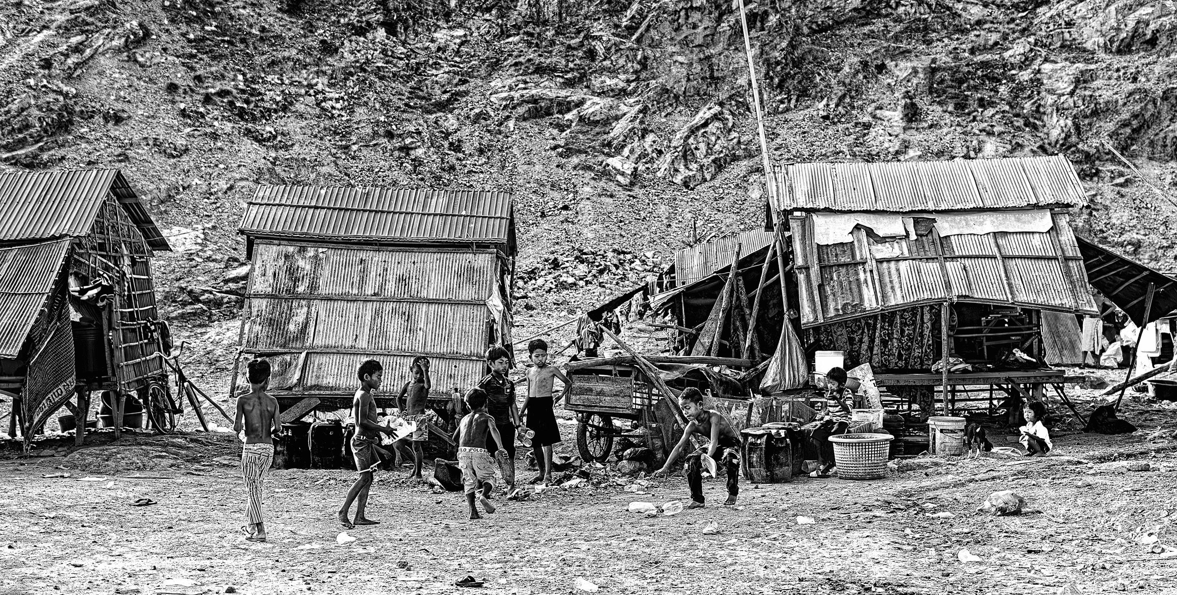 Children in Settlement Children in Settlement in daily life in monochrome.