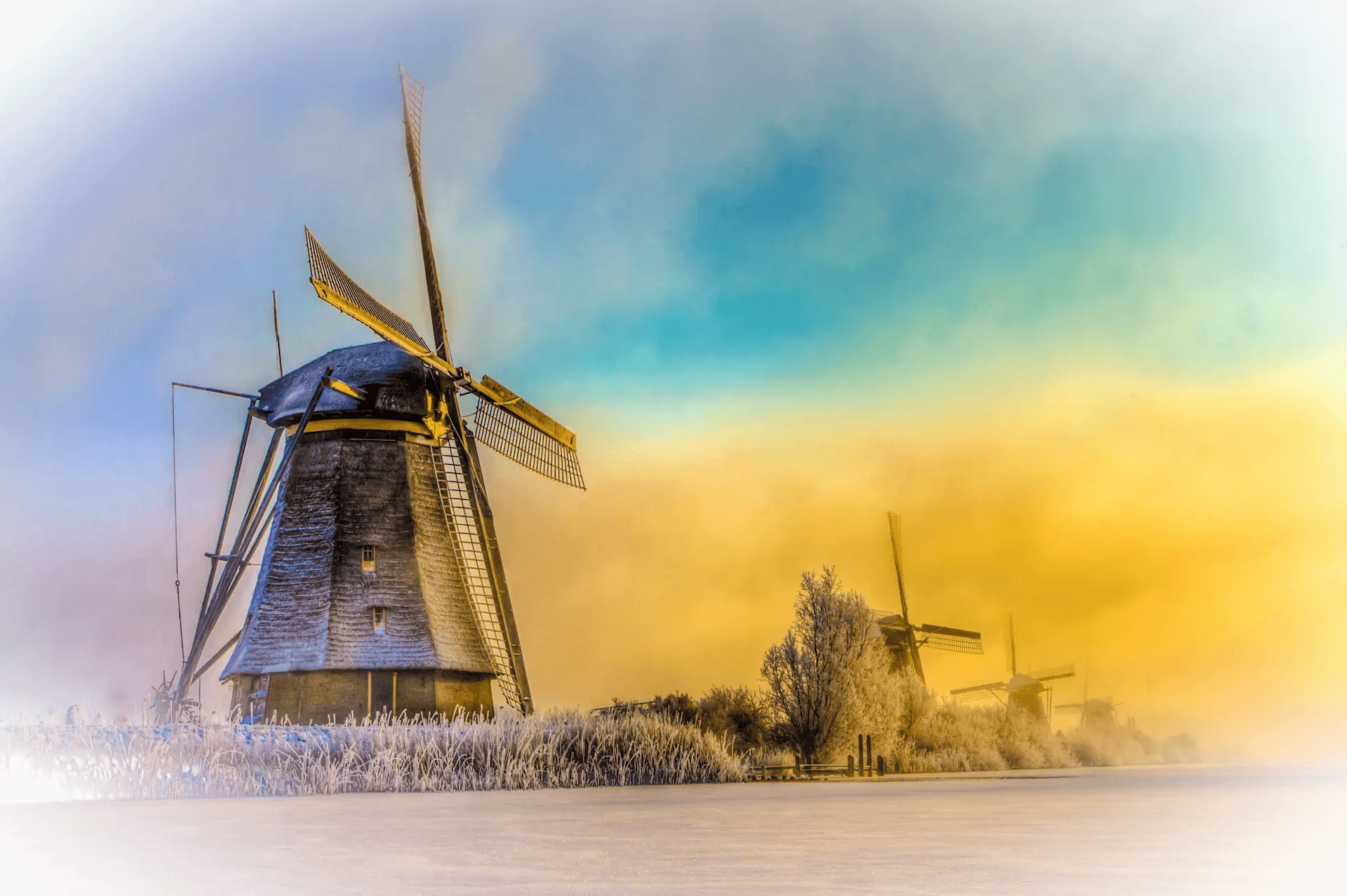 Kinderdijk Windmills in Winter Light Kinderdijk windmills under pastel winter light above frost-covered Dutch fields.