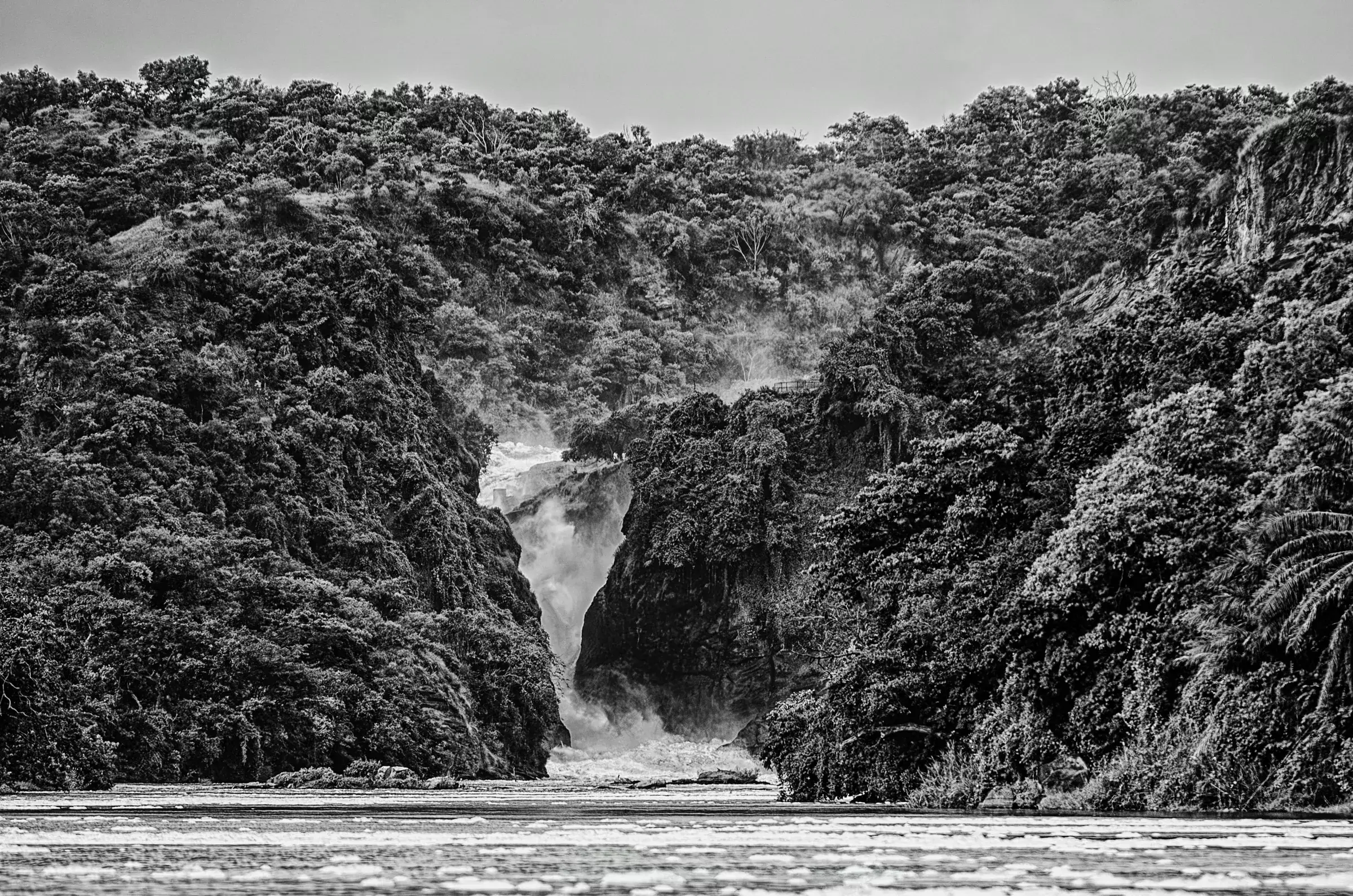 Where the Nile Roars: Murchison Gorge Black-and-white photograph of Murchison Falls forcing through a narrow gorge in Uganda.