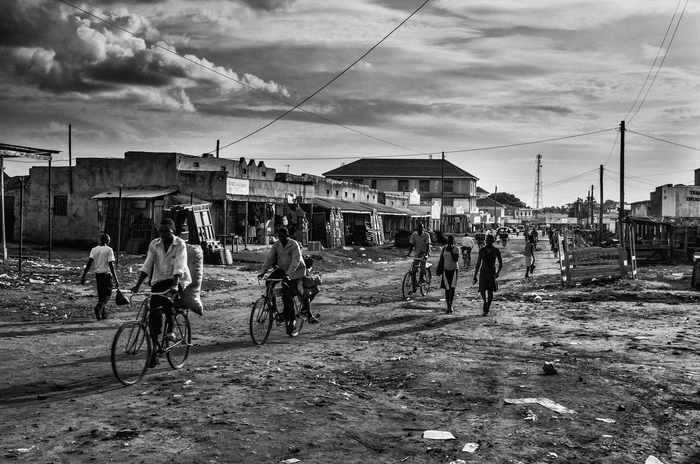 Street Scene, Northern Uganda Black and white street scene photograph in a refugee settlement in Northern Uganda.