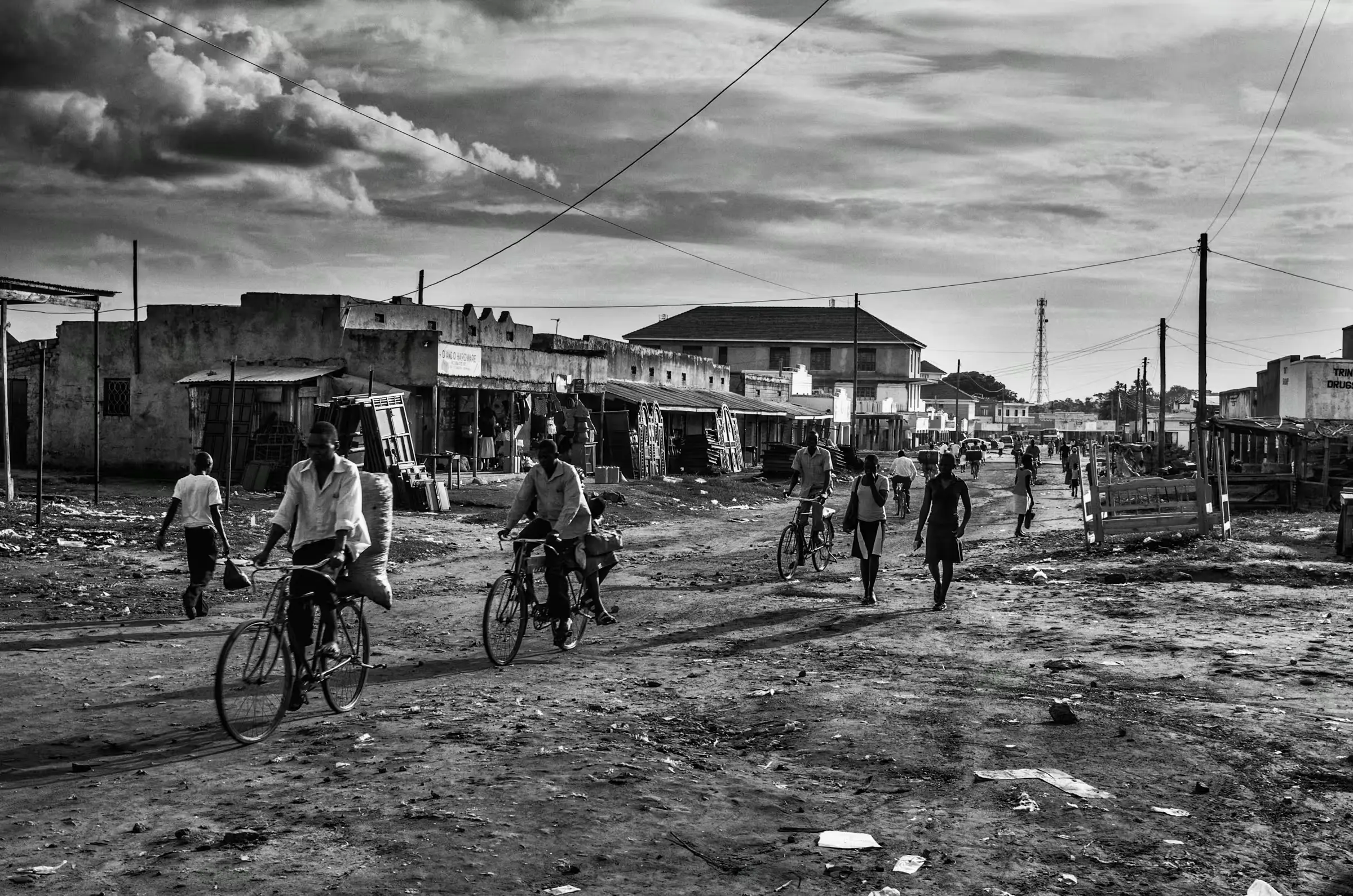 Street Scene, Northern Uganda Black and white street scene photograph in a refugee settlement in Northern Uganda.