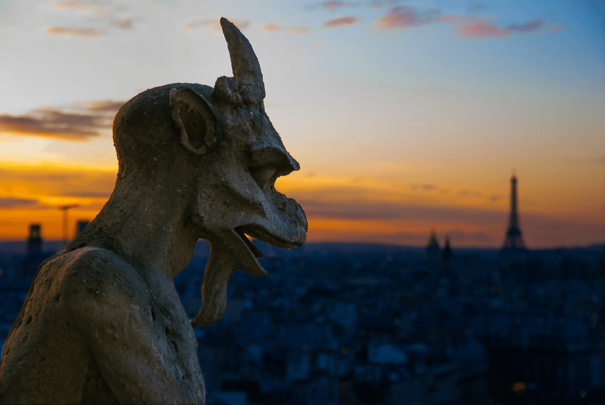 Gargoyle's Gaze: Paris at Twilight Notre Dame Gargoyle Dusk in Paris.