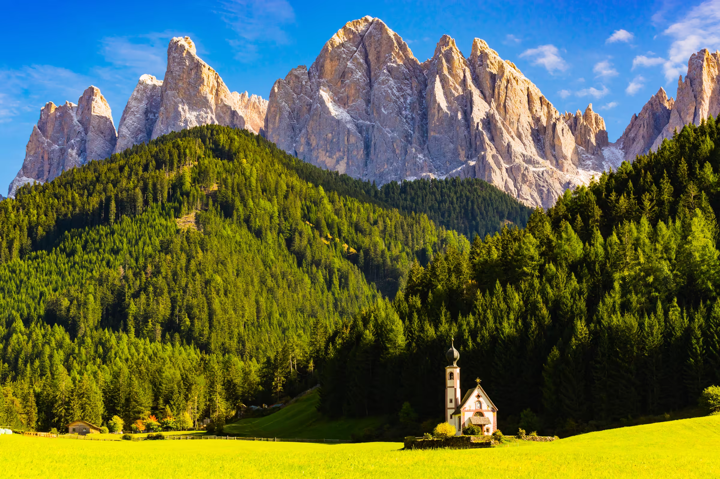 Landscape photograph of the Val di Funes in the Dolomites, Italy.  The iconic Church of St.