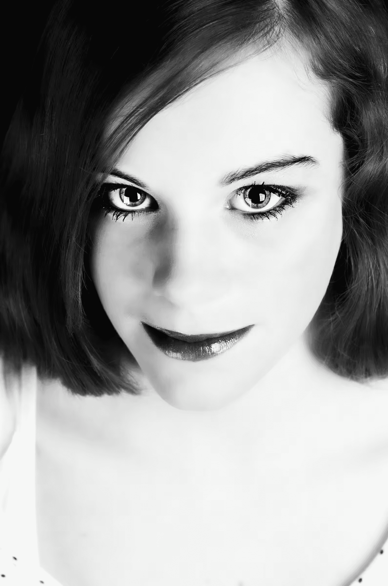Intense Gaze: Portrait Study Intense Gaze Portrait Study in a quiet portrait in monochrome.